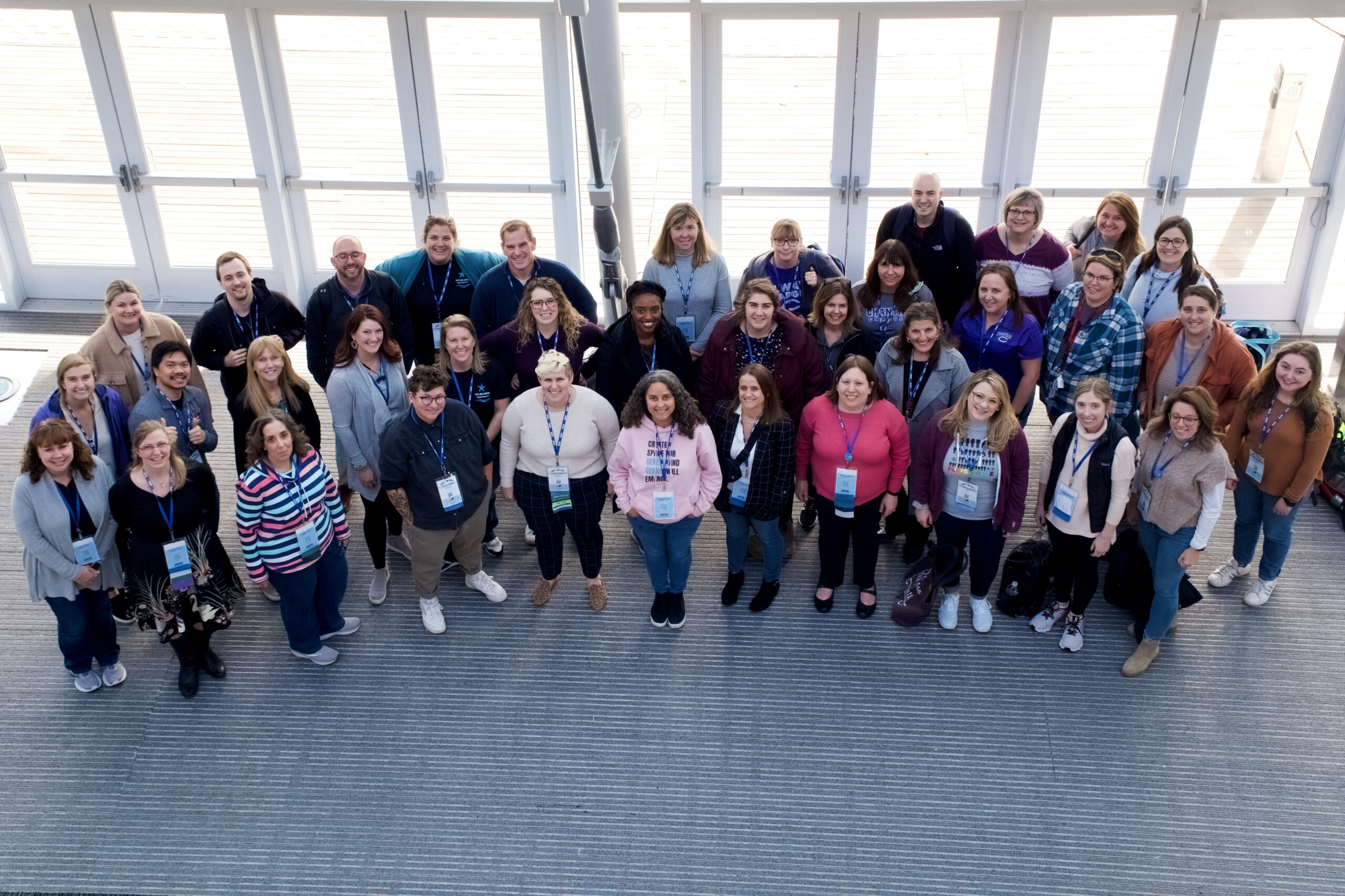 Conference attendees assembled for a group photo.